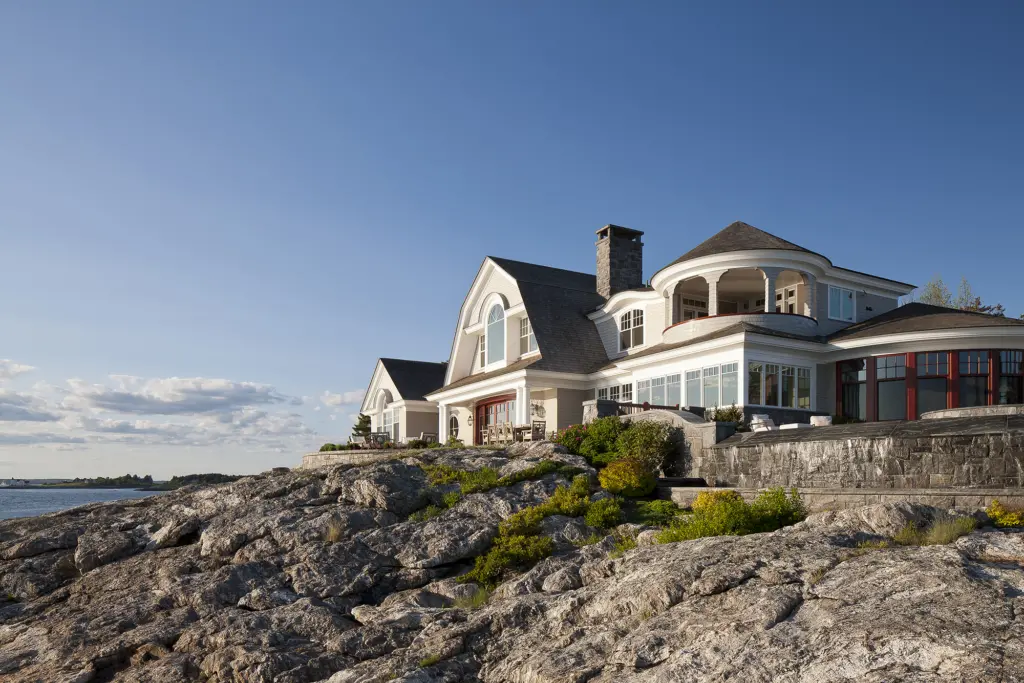 View of estate from rocky coast